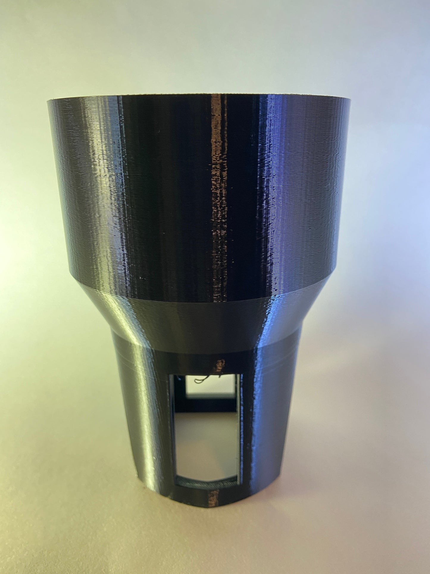 Product photo of the cup holder adapter front view